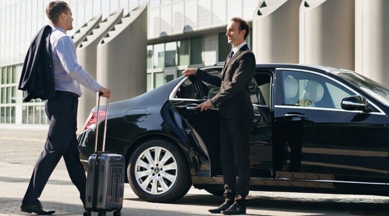 driver opening the door of a luxury car